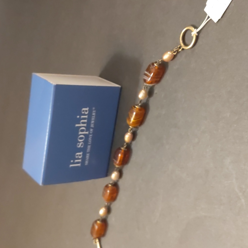 Lia Sophia Gold Toned Toggle bracelet brown and white beads